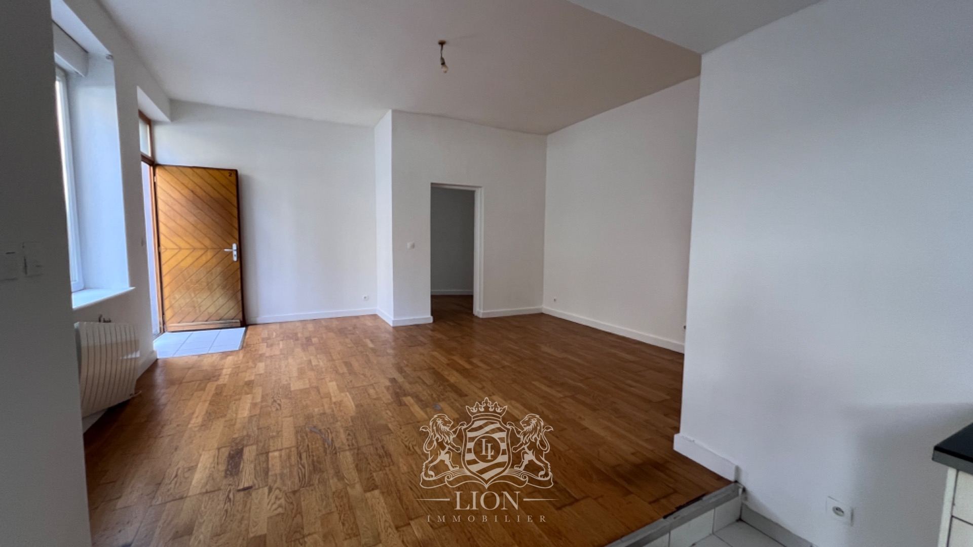 Appartement t3 avec cour et cave au rez de chaussee Photo 1 - Le Lion Immobilier