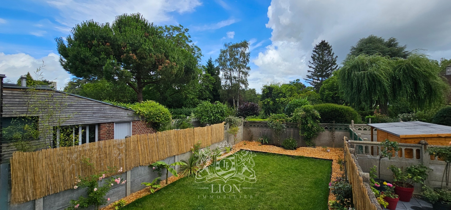 Magnifique maison avec garage dans un cadre verdoyant Photo 11 - Le Lion Immobilier