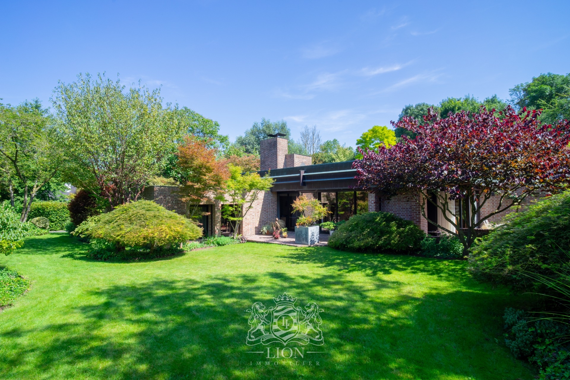 Maison avec jardin arbore au coeur de brigode Photo 1 - Le Lion Immobilier