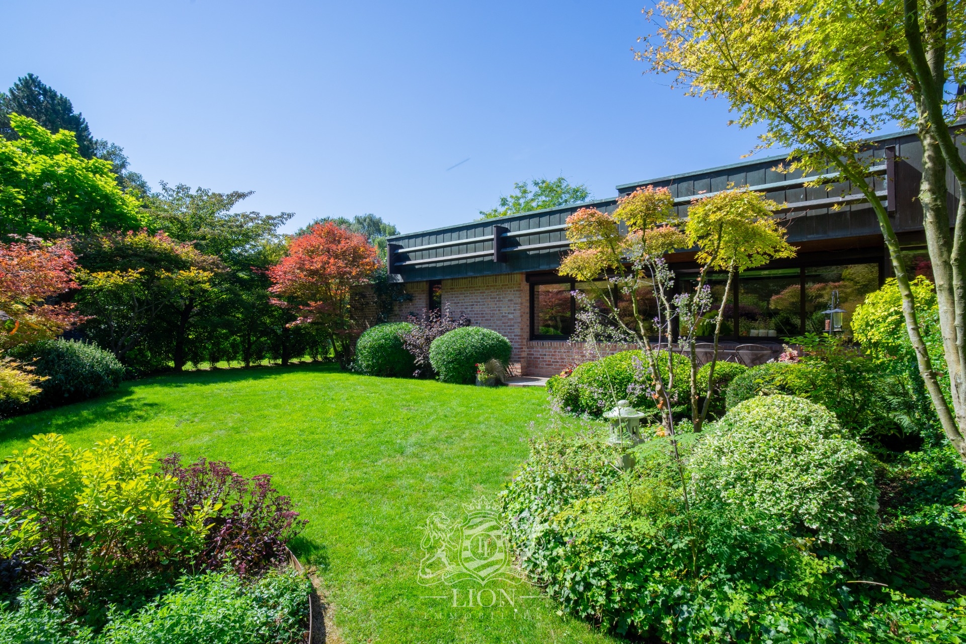 Maison avec jardin arbore au coeur de brigode Photo 3 - Le Lion Immobilier