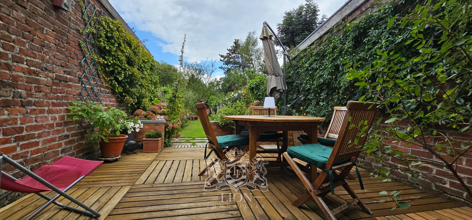 Coquette maison avec un beau jardin verdoyant Photo 9 - Le Lion Immobilier