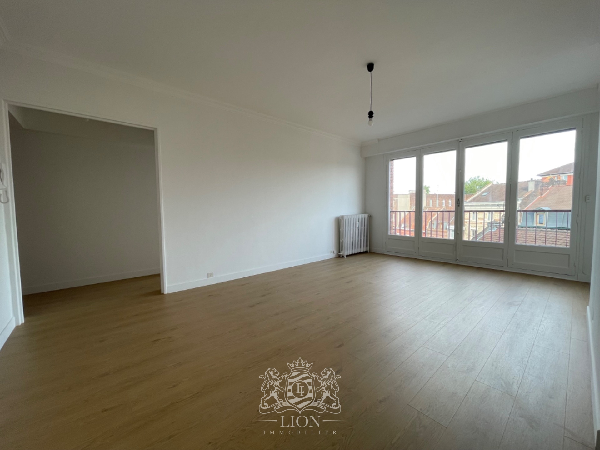 Grand appartement t2 proche ecoles Photo 1 - Le Lion Immobilier