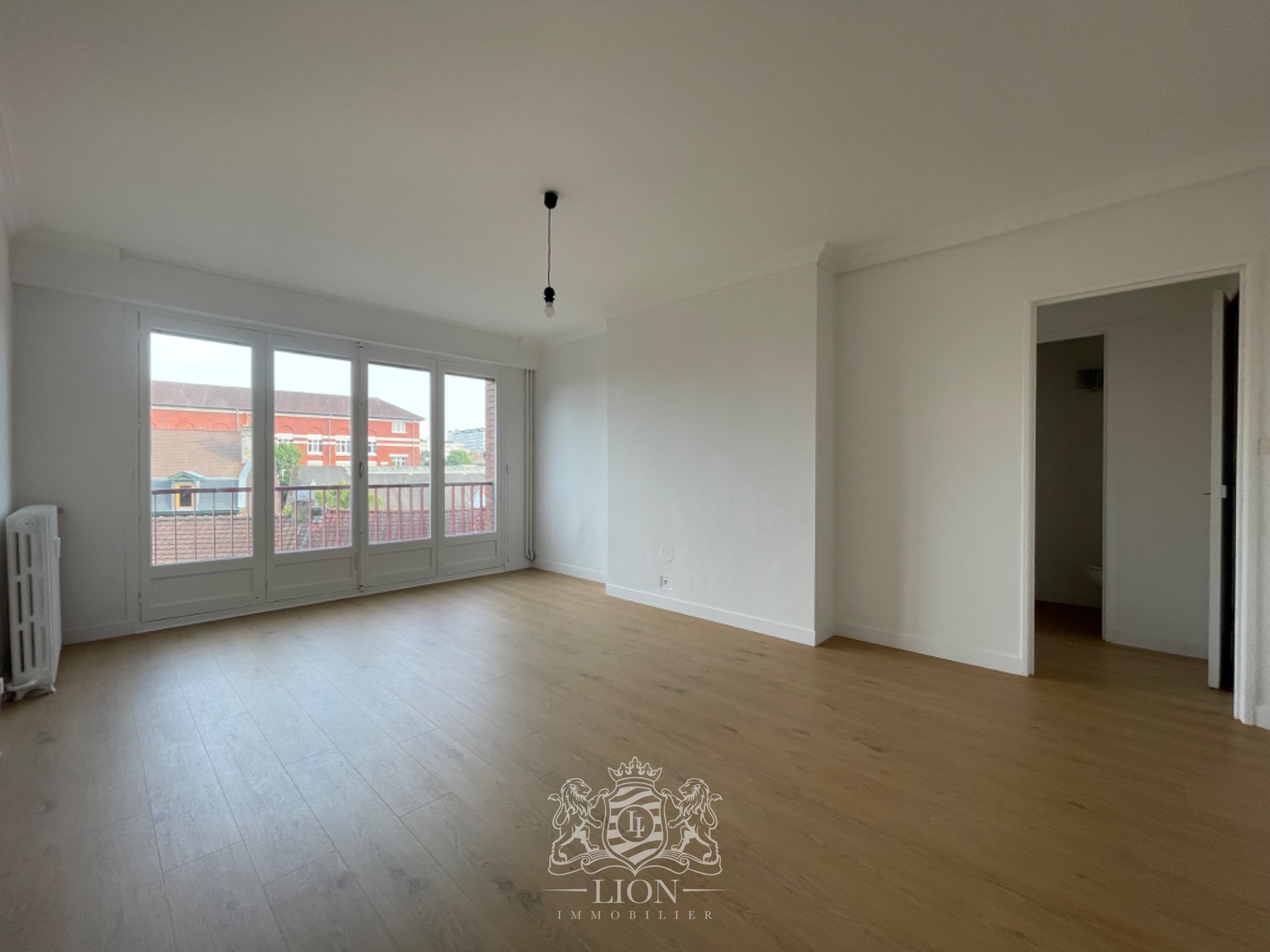 Grand appartement t2 proche ecoles Photo 2 - Le Lion Immobilier