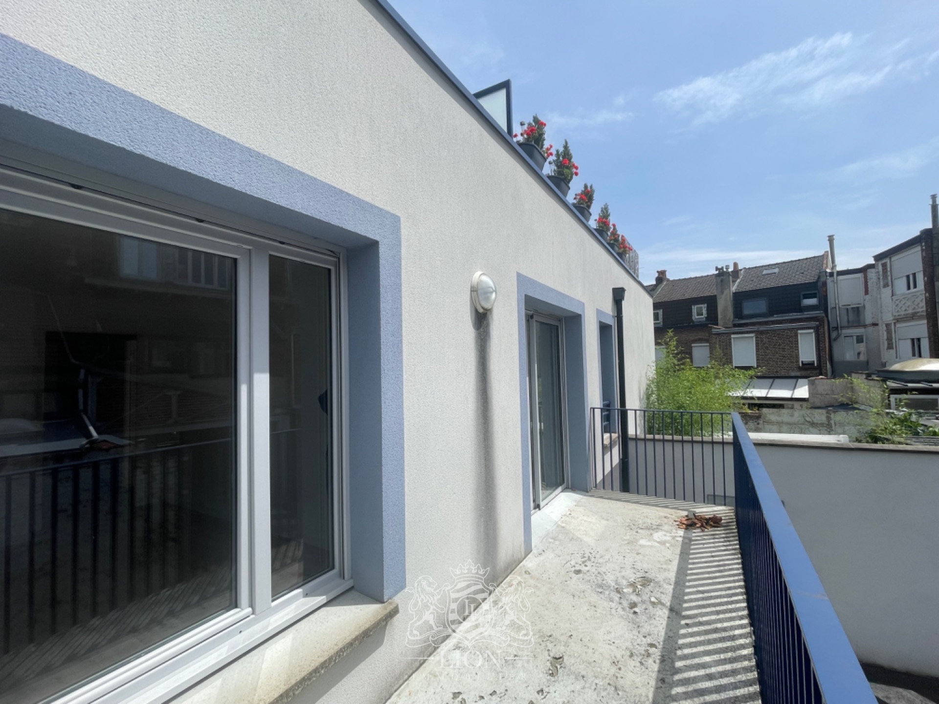 Appartement avec balcon et parking Photo 1 - Le Lion Immobilier